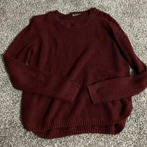 Small cotton on maroon sweater